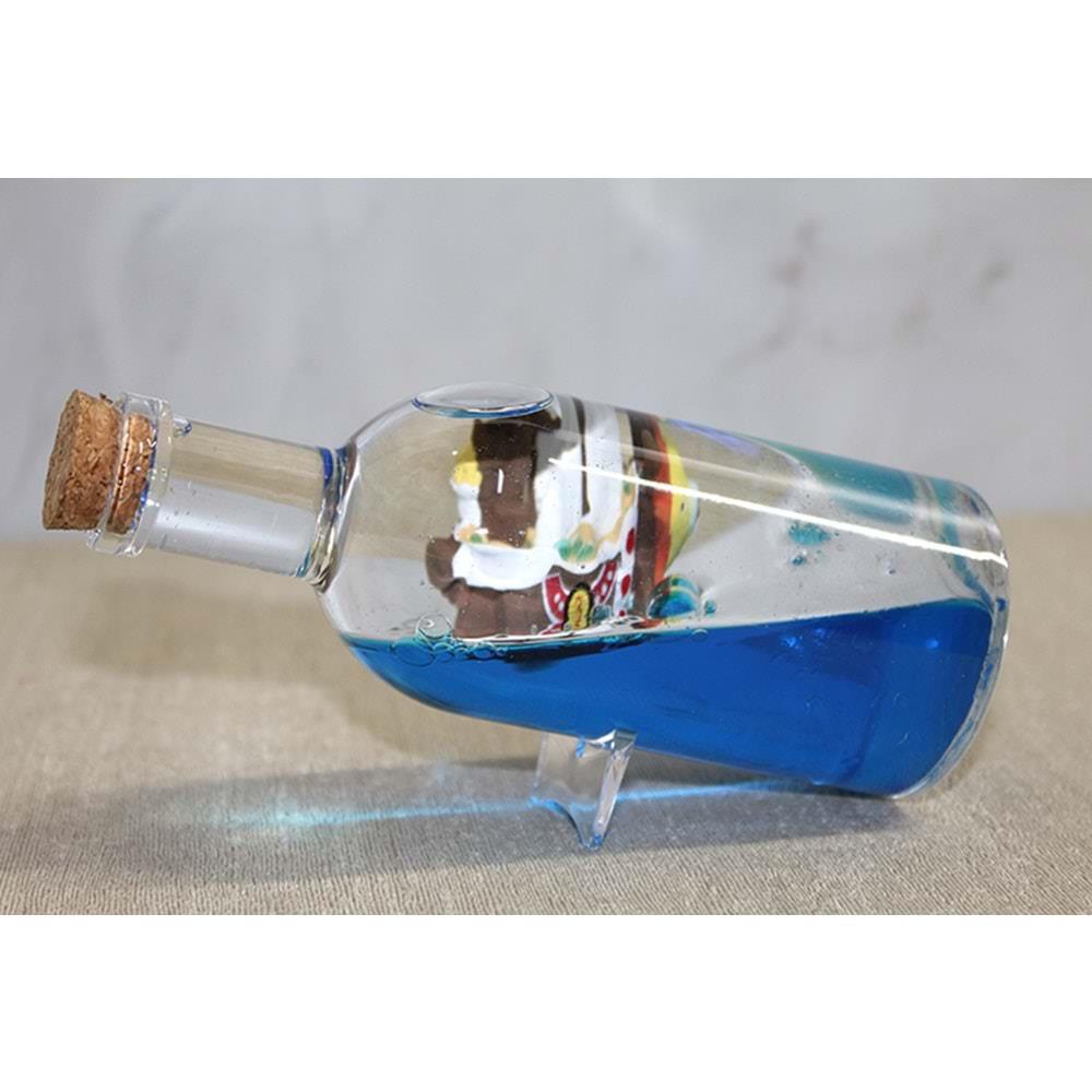 Sise Icinde Batmayan Gemi